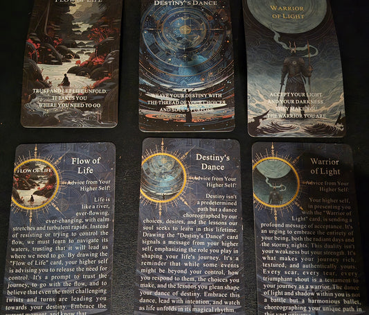 Three oracle cards, Flow of Life, Destiny’s Dance, and Warrior of Light, with their three accompanying description cards beneath them.