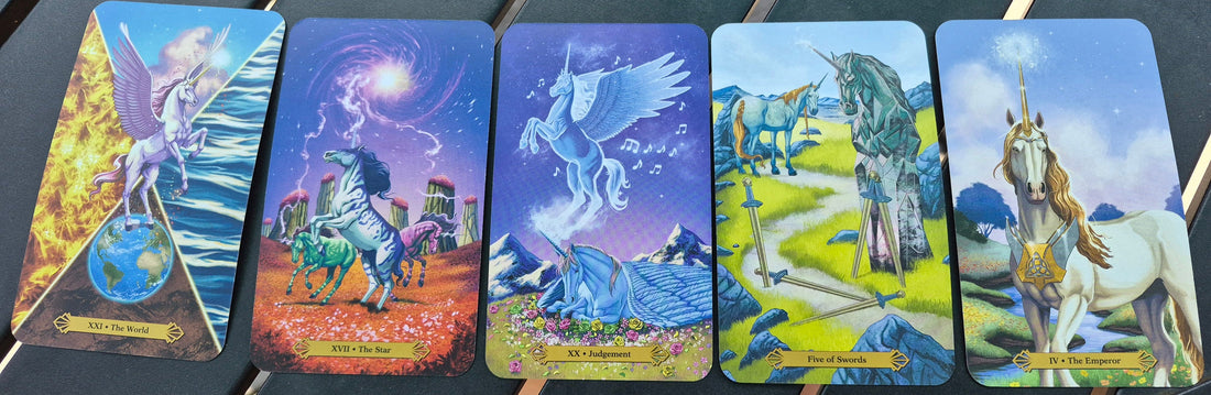 Five Unicorn Tarot cards laid out for the July 26 2026 daily collective reading: The World, The Star, Judgement, Five of Swords, and The Emperor
