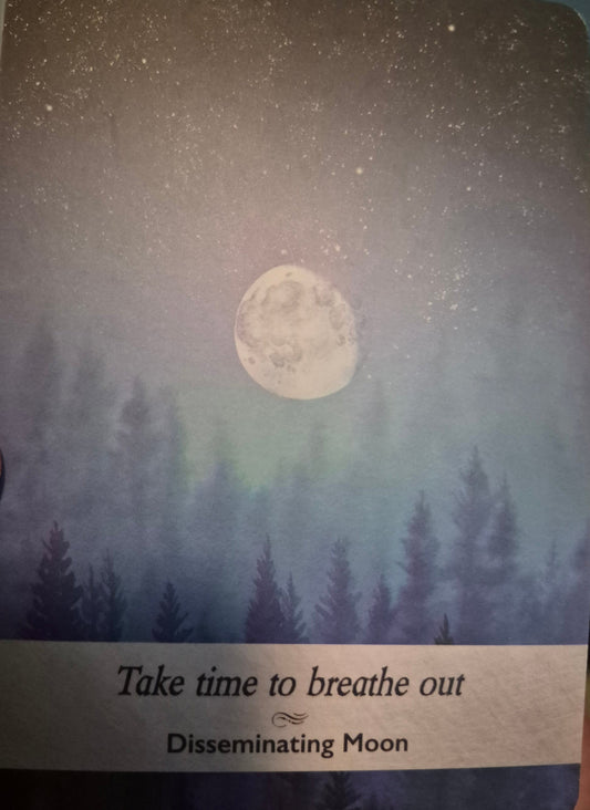 Disseminating Moon card — Take time to breathe out — moon over misty forest with starry sky