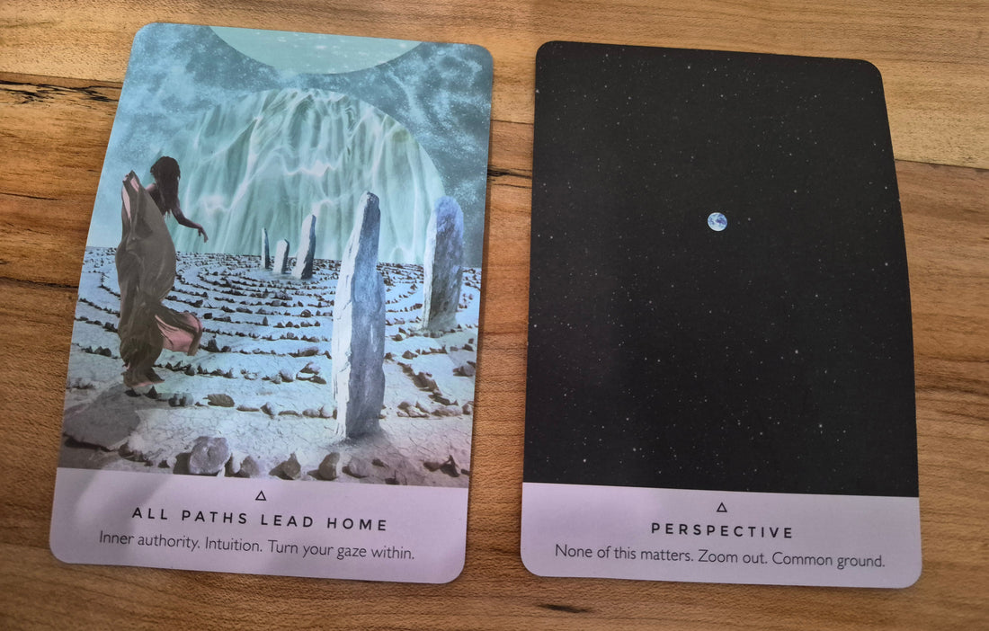 Two oracle cards: All Paths Lead Home and Perspective
