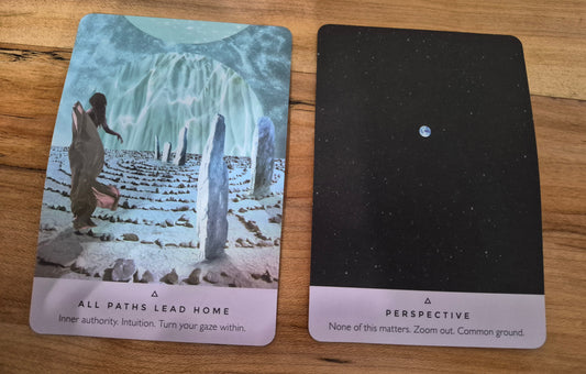 Two oracle cards: All Paths Lead Home and Perspective