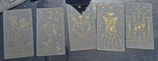 Five tarot cards laid out: Knight of Pentacles, Ace of Cups, Three of Swords, Six of Wands, Ten of Cups