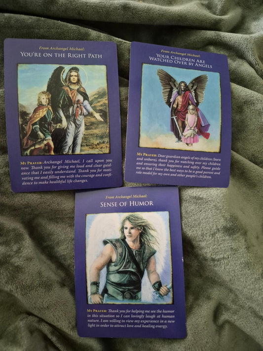 Daily Angel Card Reading featuring three Archangel Michael oracle cards