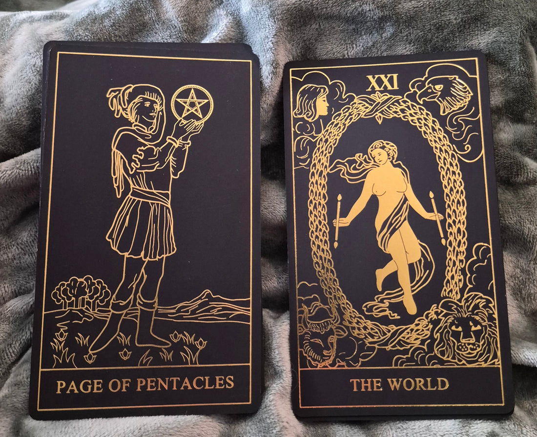 Page of Pentacles and The World tarot cards — daily collective reading April 27 2026