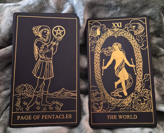 Page of Pentacles and The World tarot cards — daily collective reading April 27 2026