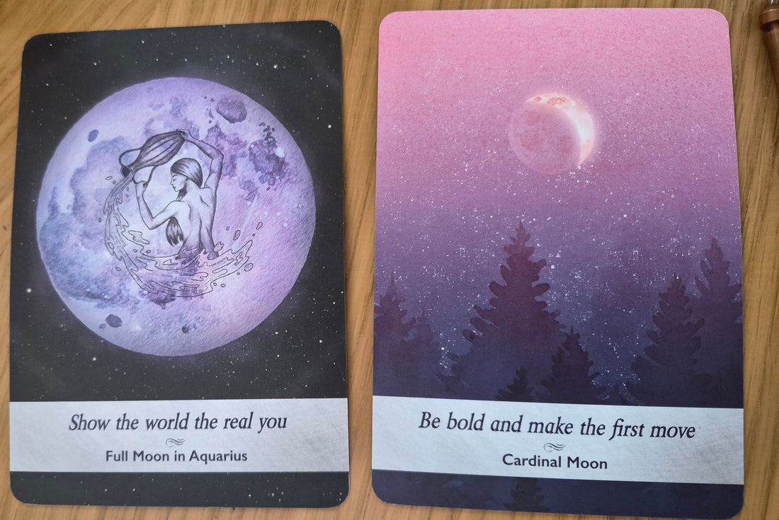Two oracle cards: Full Moon in Aquarius – Show the World the Real You, and Cardinal Moon – Be Bold and Make the First Move