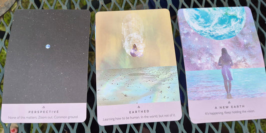 Three oracle cards laid out: Perspective, Earthed, and A New Earth — daily collective reading June 1 2026