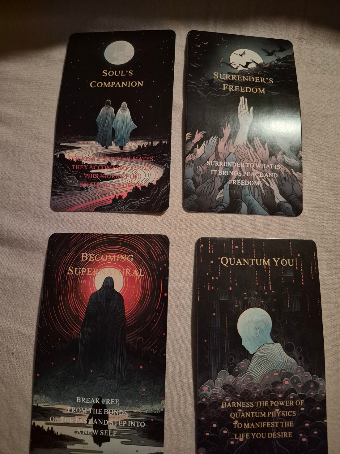 Four oracle cards laid out for the daily collective reading: Soul's Companion, Surrender's Freedom, Becoming Supernatural, and Quantum You