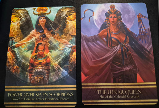 Two-card oracle spread showing Power Over Seven Scorpions on the left and The Lunar Queen on the right.